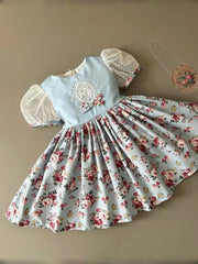 Vintage Floral Ball Gown with Embroidered Blue Bodice