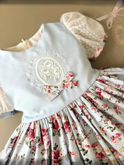 Vintage Floral Ball Gown with Embroidered Blue Bodice