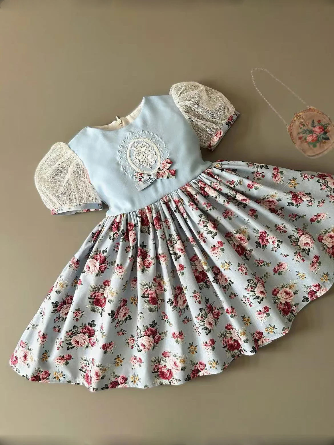 Vintage Floral Ball Gown with Embroidered Blue Bodice